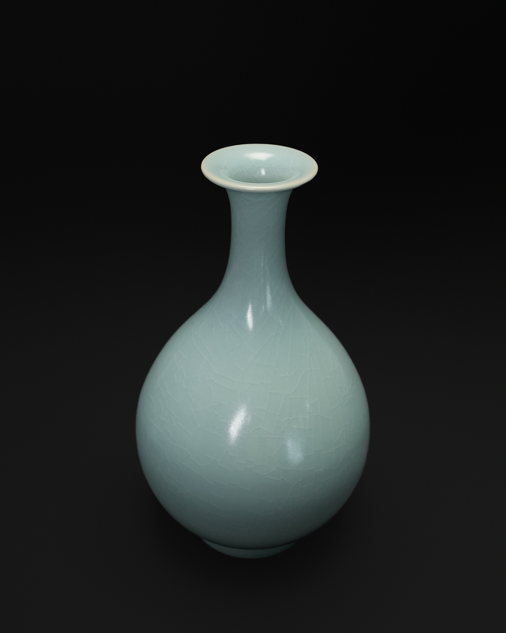 Three-quarter view of the Yuhuchun vase showing its flared mouth and rounded pear-shaped body.